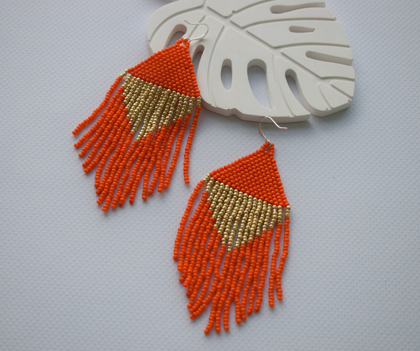 Orange and gold beaded earrings