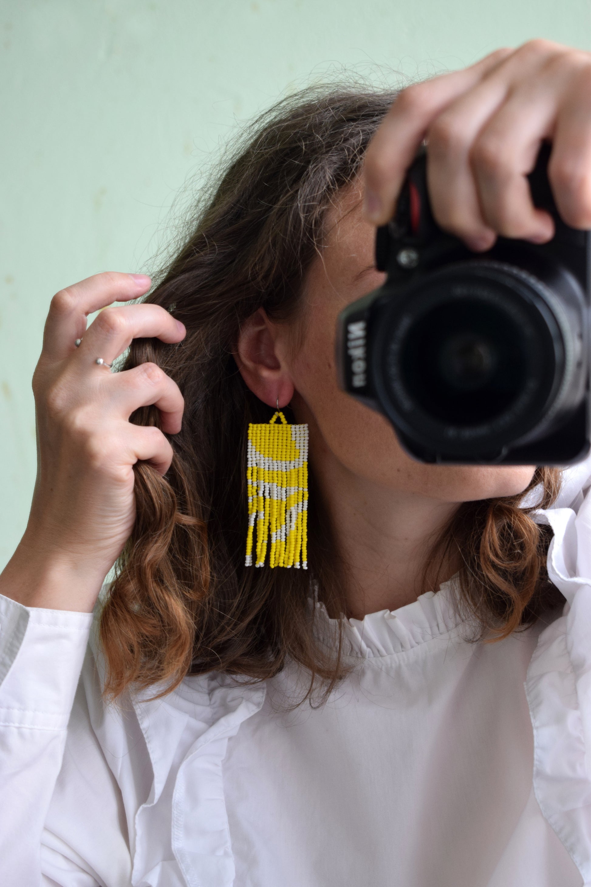 White and yellow beaded earrings