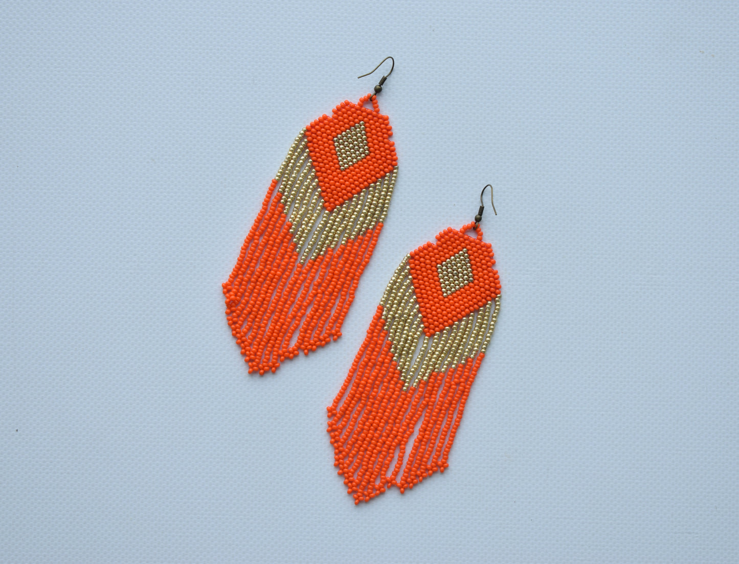 Orange and gold beaded earrings