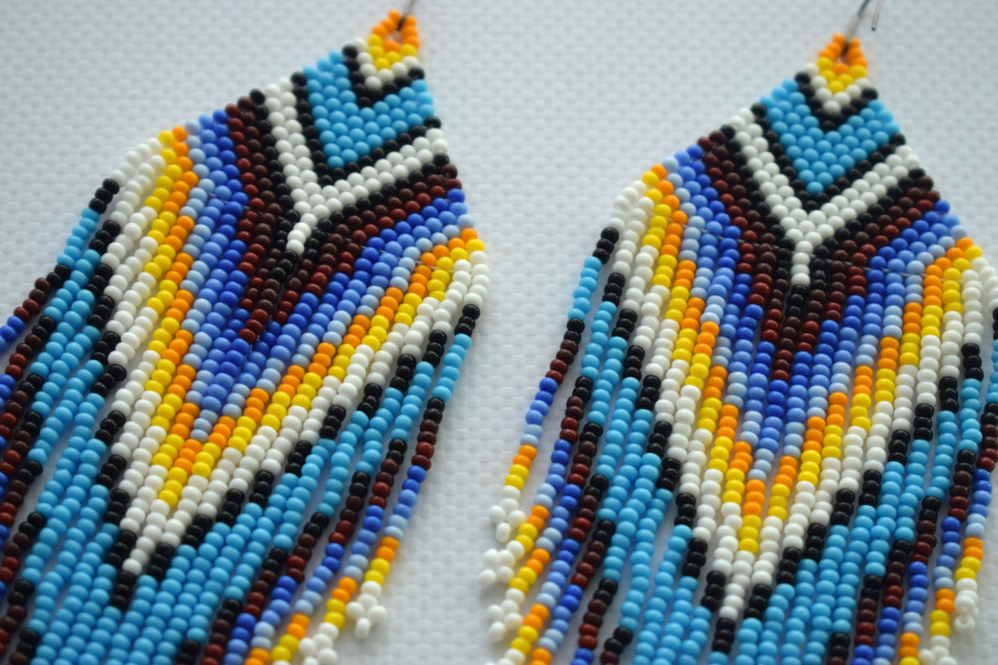 Extra long beaded earrings