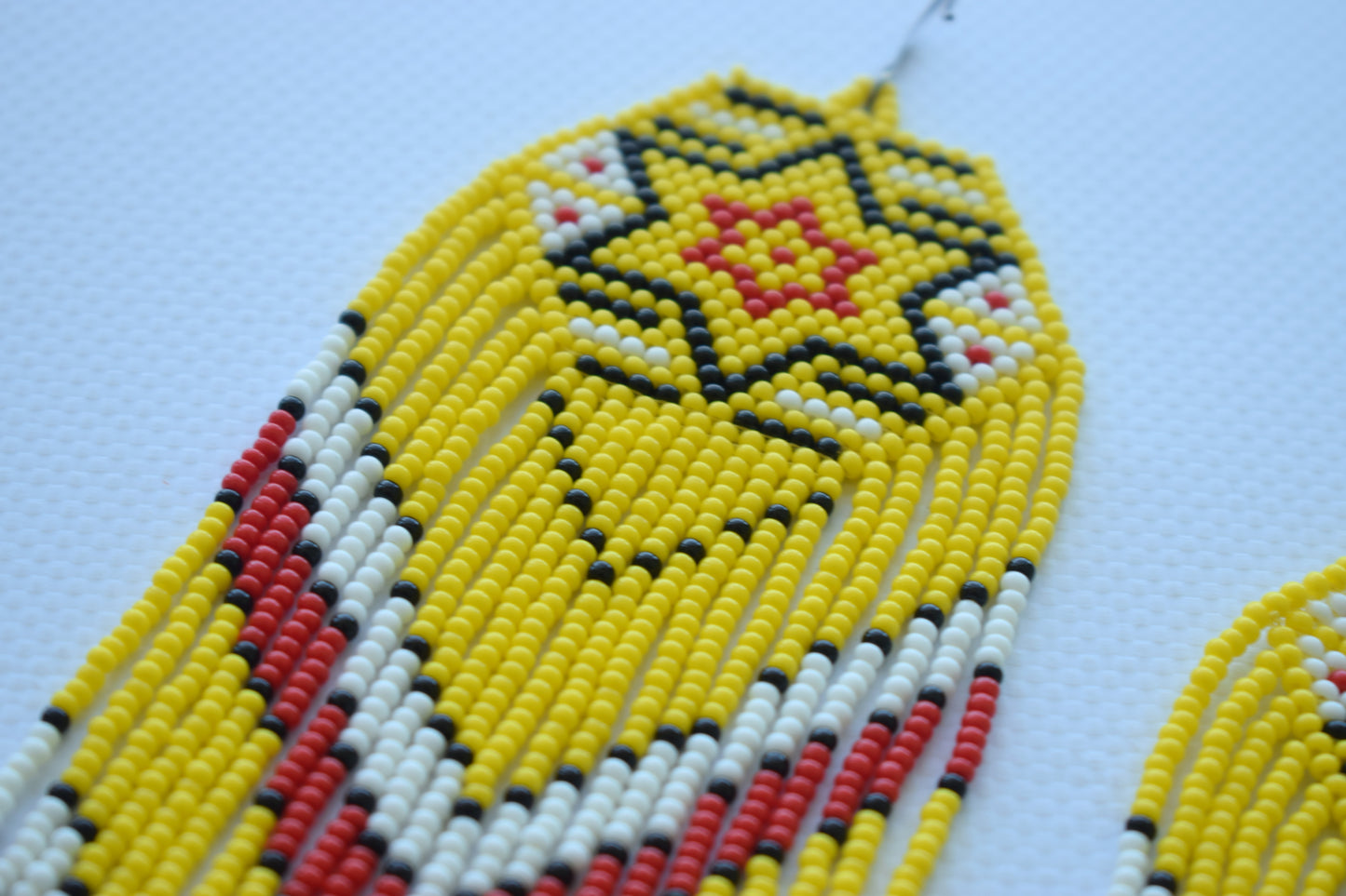 Yellow beaded earrings in native american style