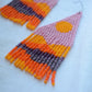 Orange, pink and lavender beaded earrings with mountains print