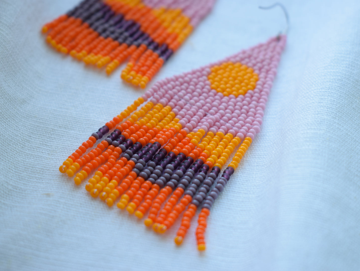 Orange, pink and lavender beaded earrings with mountains print