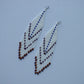 White with navy blue fringe bead earrings