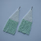 Unusual beaded earrings with fringe