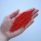 Red fringe earrings