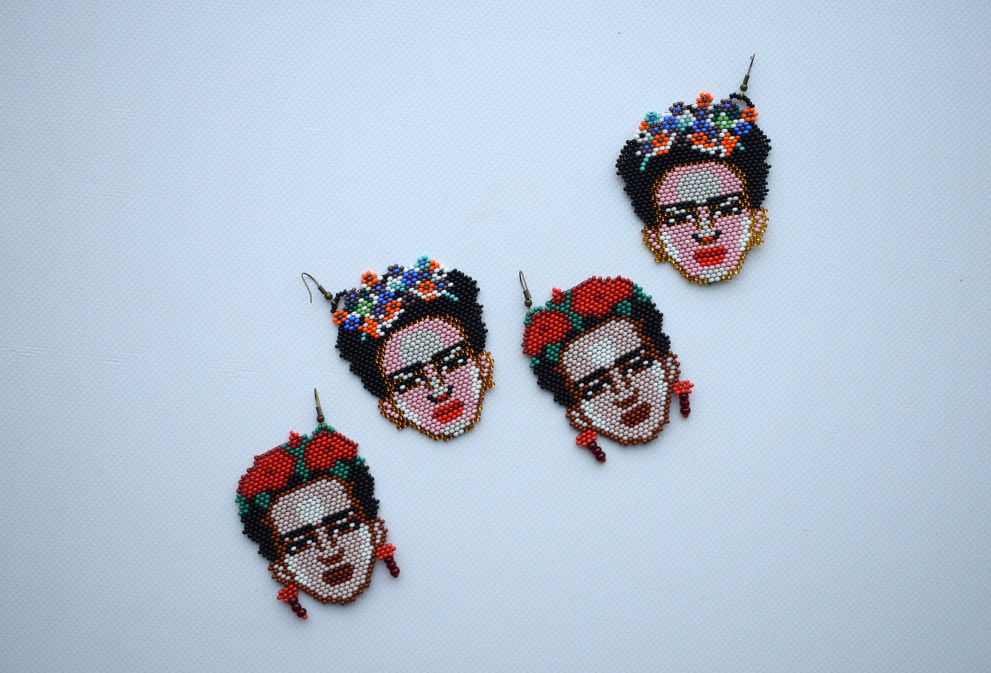 These are beaded earrings Frida Kahlo. These beaded earrings are made of high-quality Czech beads. These earrings are colorful, fashionable and highly versatile, suitable for everyday wear. Completely handmade❤️  Length (*with hooks) - approx. 7 cm (2.7 inches). Width - approx. 5.5 cm (2.1 inches).  If you have any questions just write me a message. I am always in touch and reply asap!