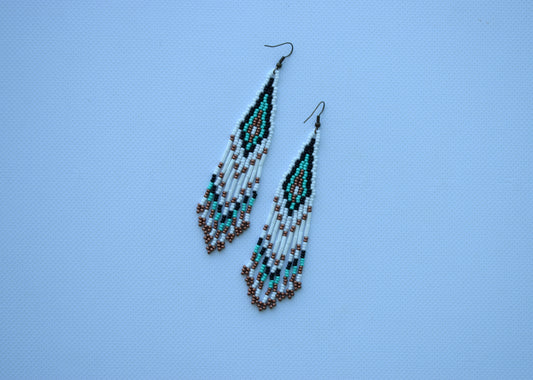 These are beaded earrings in Bohemian style. These beaded earrings are made of high-quality Czech beads. These earrings are long, lightweight, delicate, fashionable and highly versatile, suitable for everyday wear.  Length (*without hooks) - 11 cm (4.3 inches). Width - 2 cm (0.7 inches).  If you have any questions just write me a message. I am always in touch and reply asap!