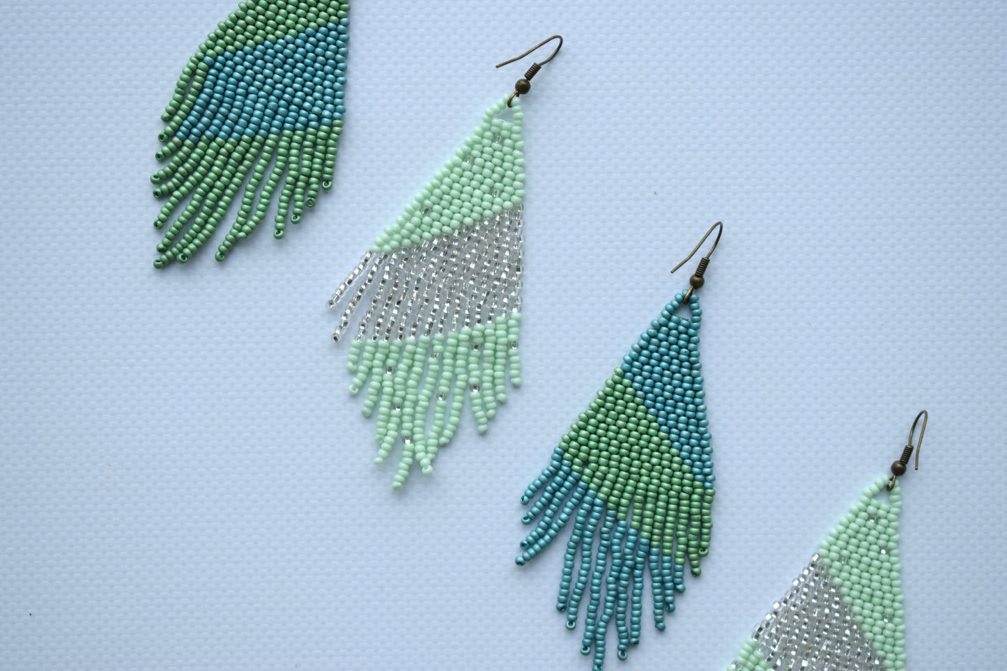 These are mint and turquoise beaded earrings. These beaded earrings are made of high-quality Czech beads. These earrings are long, lightweight, delicate, fashionable and highly versatile, suitable for everyday wear.  Length with hooks - 9.5 cm (4.3 inches). Width - 3.5 cm (0.9 inches).  If you have any questions just write me a message. I am always in touch and reply asap!